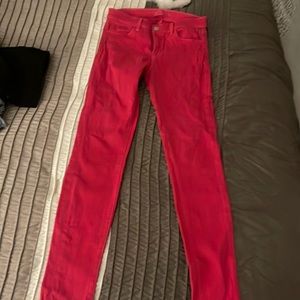 Red J Brand skinny jeans.